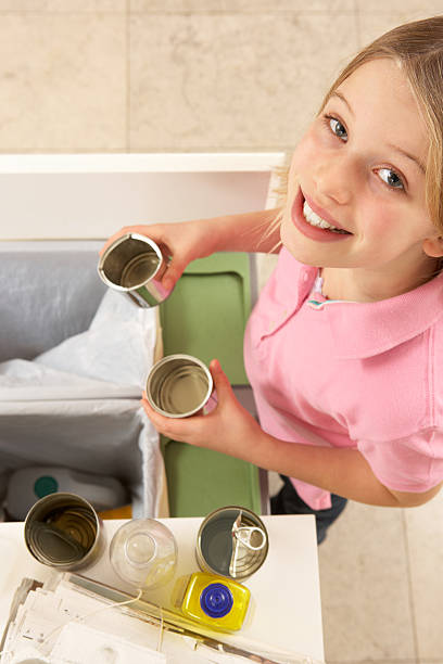 istock Young Girl Recyling Waste At Home 121028979