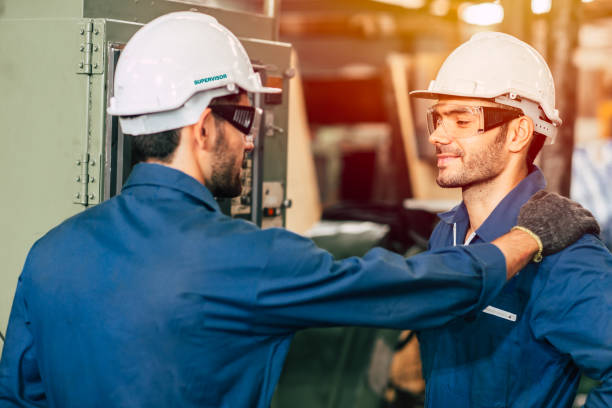 engineer supervisor admired and proud his worker team, working good more efficiently. engineer supervisor admired and proud his worker team, working good more efficiently. admired stock pictures, royalty-free photos & images