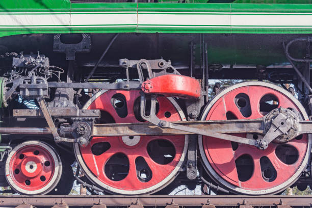 Wheels of the retro steam train standing by the platform.