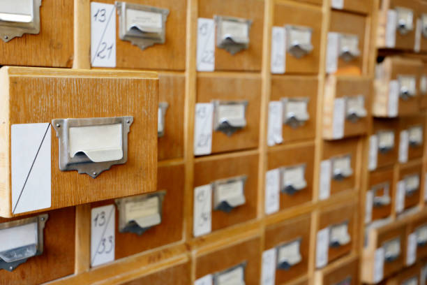 istock Archive catalog, data cards in old wooden boxes 1210292380