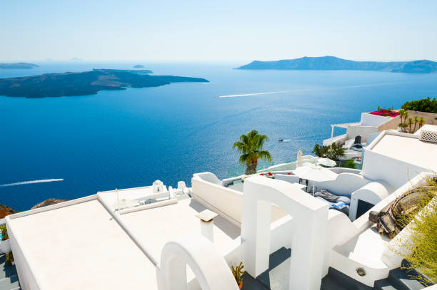 istock White architecture and blue sea on Santorini island, Greece. 1210294304
