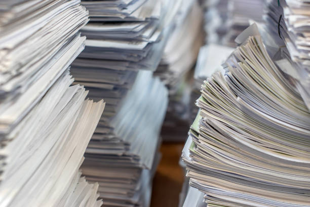 istock pile of paper documents in the office 1210297274