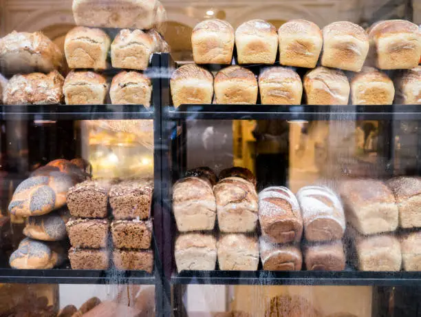 Newly baked bread on display in bakery window