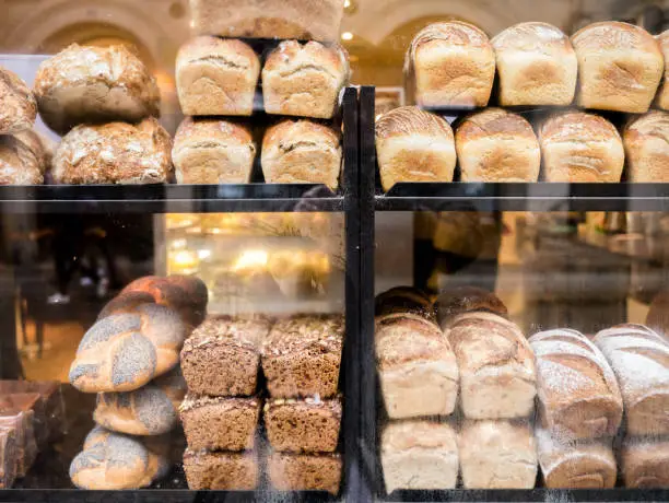 Newly baked bread on display in bakery window