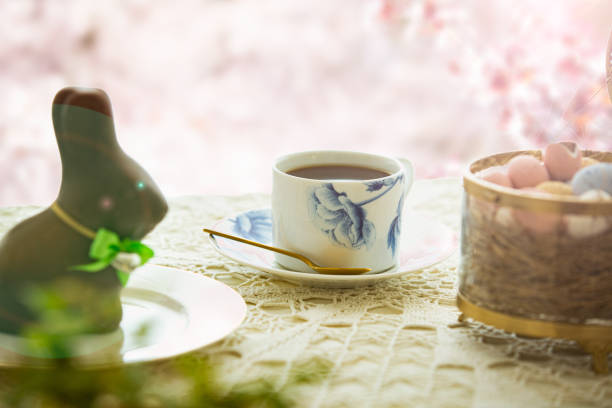 istock Beautiful served small table with Easter decorations on outdoor terrace. 1210303074