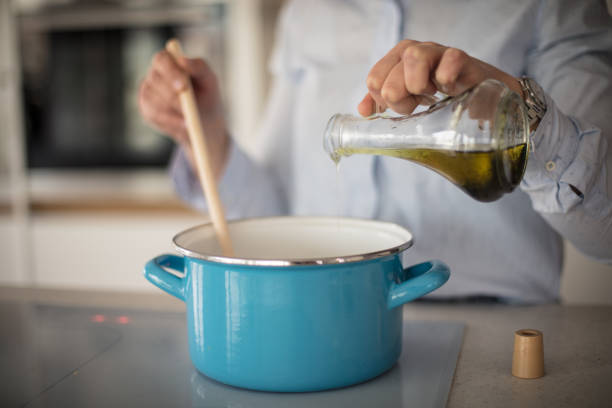 istock It's her turn to cook today. 1210304230
