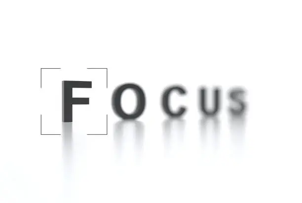 Photo of The word FOCUS with focus in the foreground and a blurred background. Interface viewfinder. Video camera focusing screen. Camera frame. Creative conceptual illustration with copy space. 3D render
