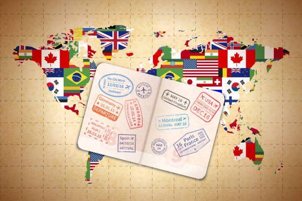 istock Open foreign passport with international visa stamps on ancient world map with flags on old paper 1210308793