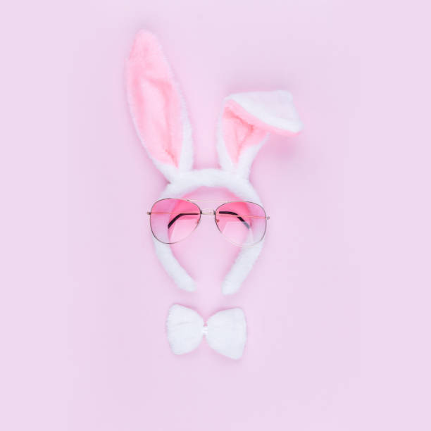istock Fluffy Easter Bunny costume with pink glasses 1210309347