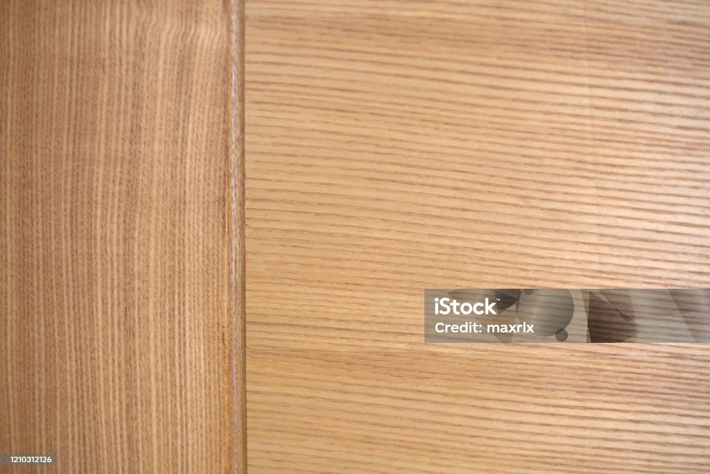 Closeup of wooden door pattern Closeup of beige wooden door pattern Angola Stock Photo