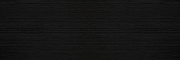 istock Dark black concrete wall with rustic natural texture for abstract background texture and design purpose 1210314512