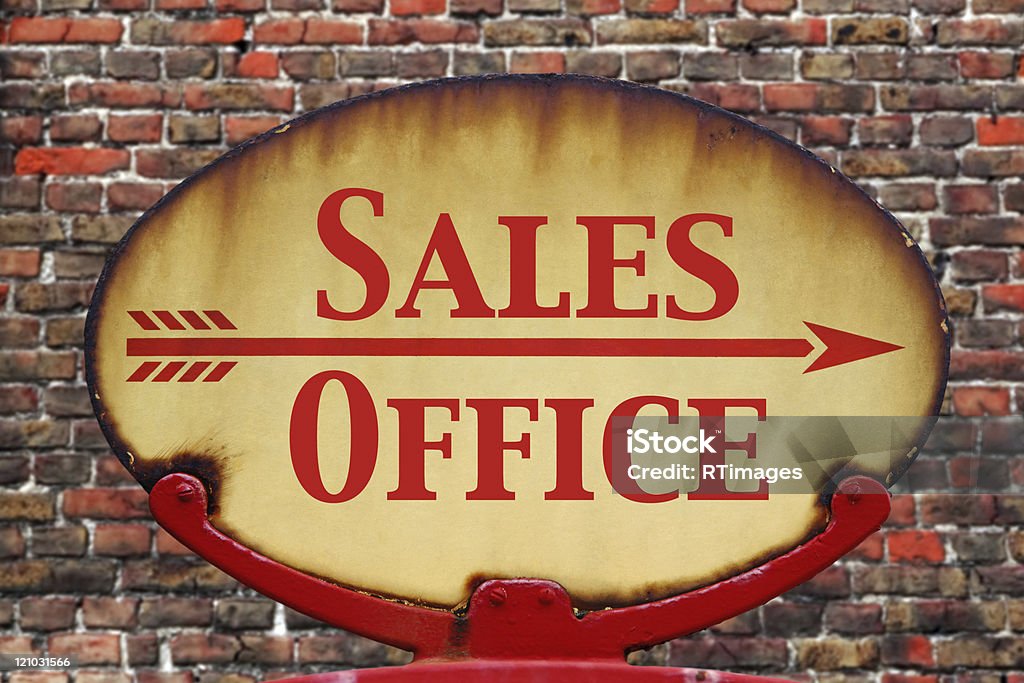 Retro sign Sales Office A rusty old retro arrow sign with the text Sales Office Arrow Symbol Stock Photo