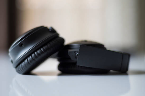 istock Close-up Shot of Wireless Bluetooth Hedphones on White Background 1210316588