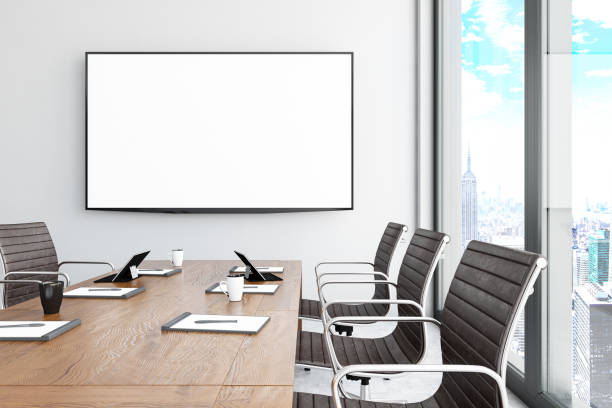 Modern Board Room with Blank TV Screen Modern Board Room with Blank TV Screen. 3d Render wall of monitors stock pictures, royalty-free photos & images