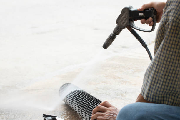 istock man washing dirty dust bacteria pm2.5 air condition electronic part cooler fan filter unclean 1210321530