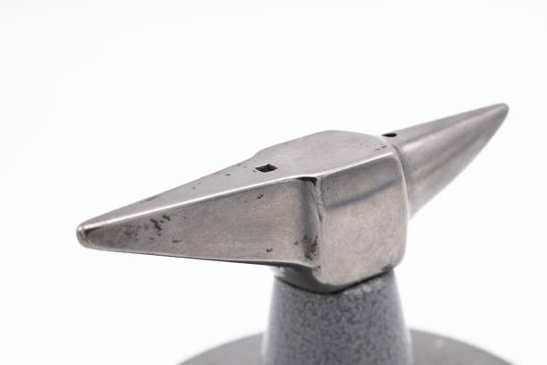 sledgehammer and anvil isolated on white background