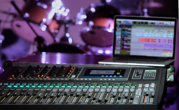 istock Digital mixer in a recording Studio , with a computer for recording music. The concept of creativity and show business. 1210323409