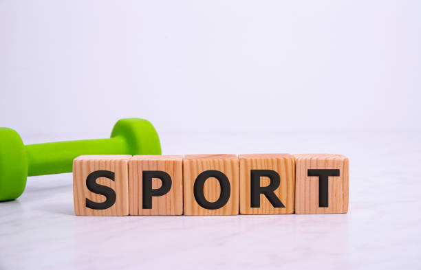 Cube Letters Sport with green dumbbell. Sport concept.