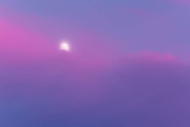 istock Full moon and pink clouds at sunset. Nature background. Soft focus 1210326249