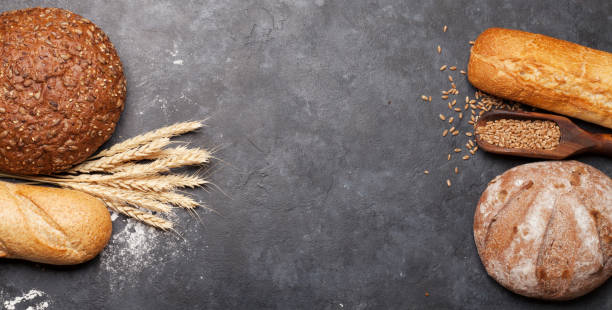 istock Various bread with wheat, flour and cooking utensils 1210331385