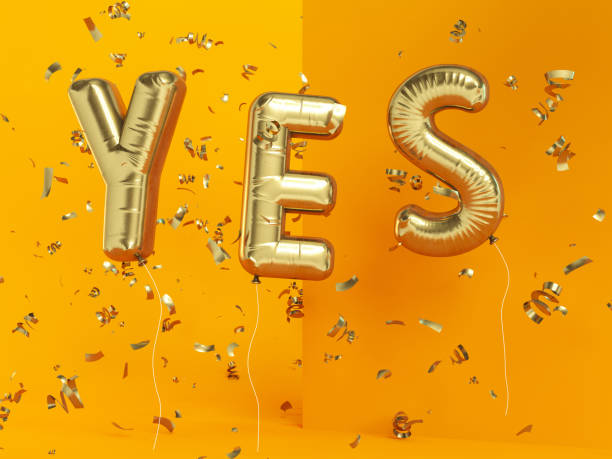 istock YES Balloon Sign with Confetti 1210333378
