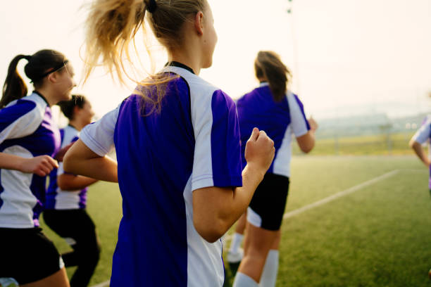 istock Soccer players warming up before the match 1210334940