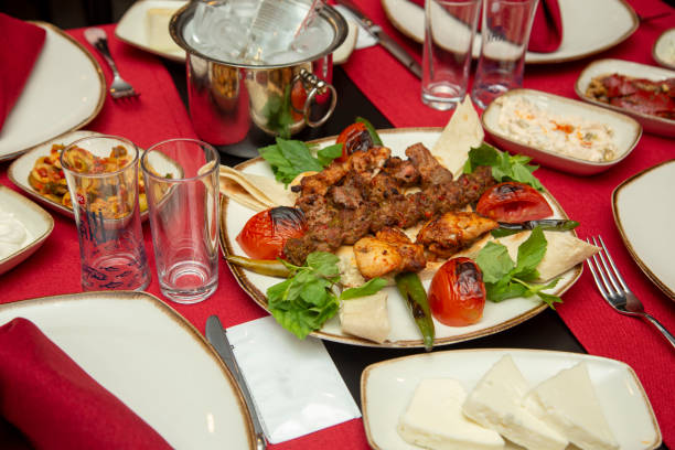 istock traditional turkish and greek drink raki table 1210335043