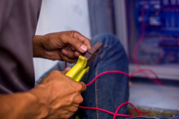istock The electrician connected the electrical wires in the electrical control cabinet. 1210336473
