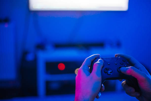 Gamer Hands with game pad Gamer Hands with game pad game controller photos stock pictures, royalty-free photos & images