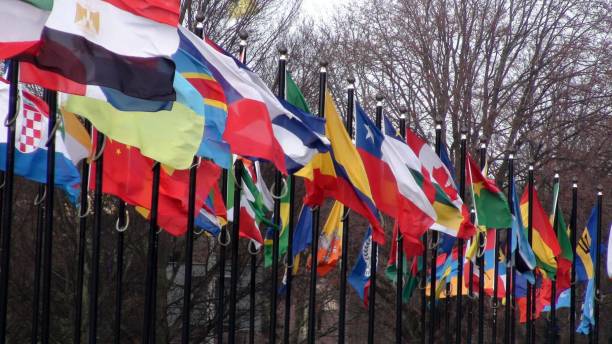 istock Waving International Flags Scene During The Day 1210337230
