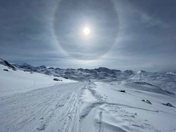 istock Spectacular sun in the snowy mountain 1210338479