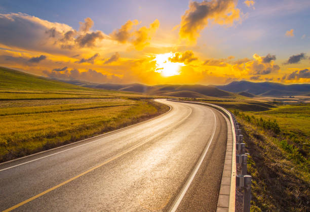 istock The winding road at dusk 1210338483