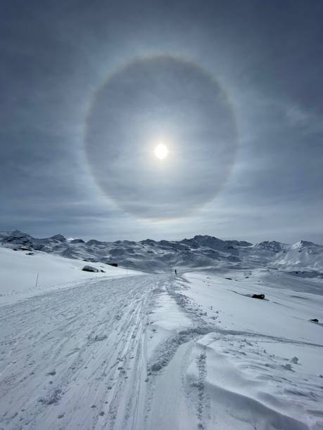 istock Spectacular sun in the snowy mountain 1210338493