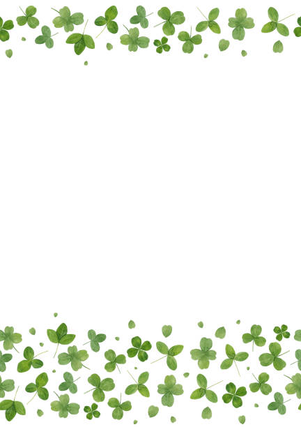 istock Watercolor background border with green leaves of clover isolated on white. Frame with copy space 1210338860