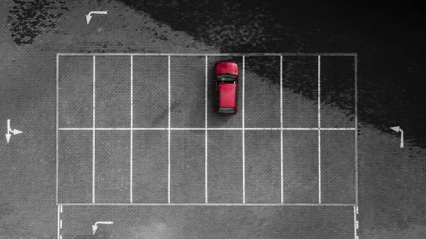 Aerial drone view of one red car parked