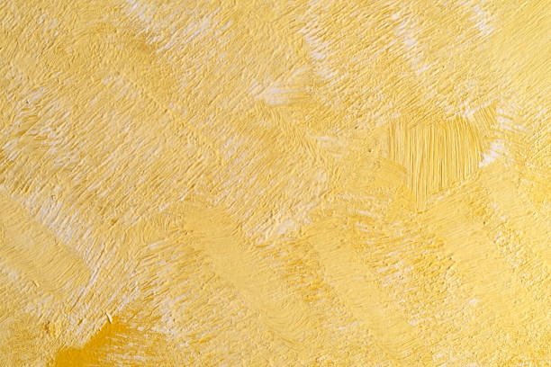 istock Yellow and white background with rough brush strokes 1210341533
