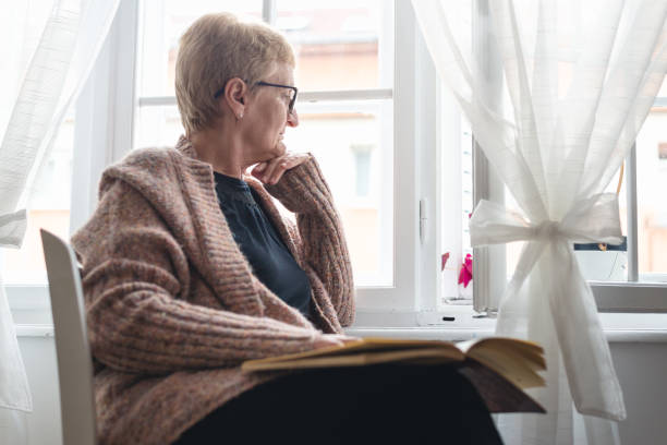 istock Senior woman relaxing at home. 1210342085