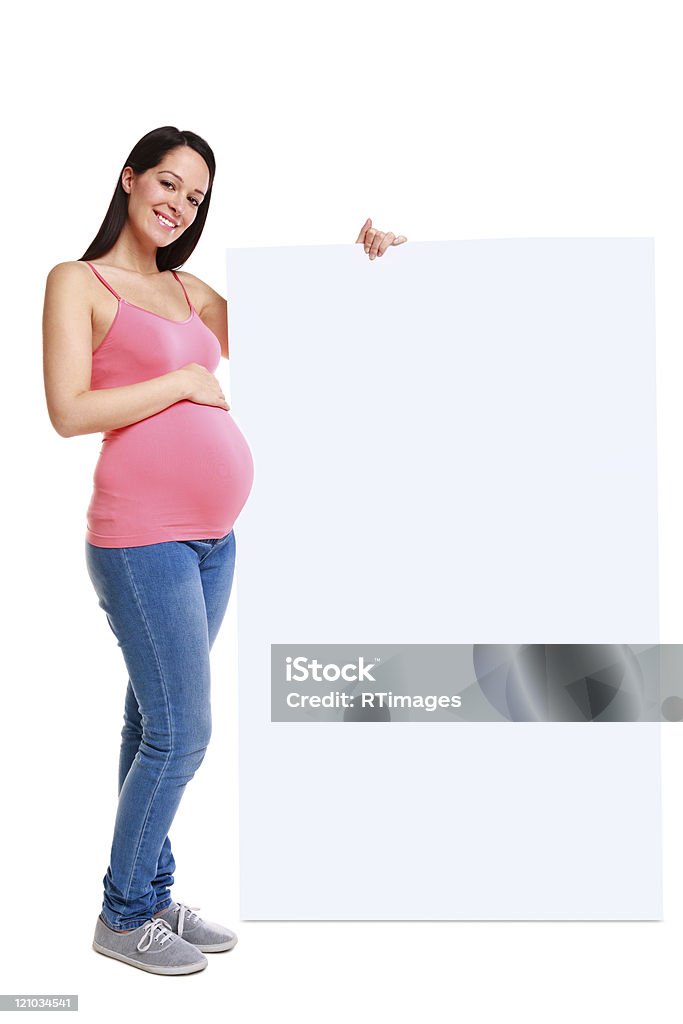 Femme enceinte tenant vierge signe. - Photo de Être enceinte libre de droits