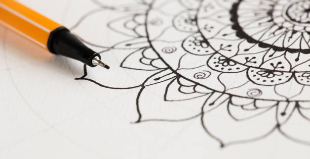 istock Mandala black and white drawing on paper with pen 1210350905