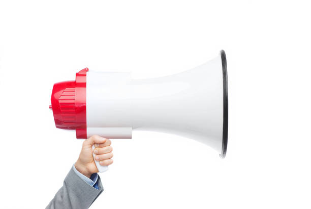 istock businessman in suit holding megaphone 1210351601