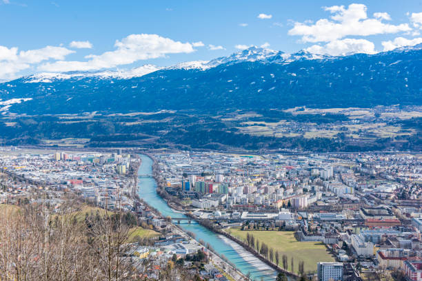 Aerial view of Innsbruck city in Austria. Aerial view of Innsbruck city in Austria. Located in the Inn valley in the Austrian Alps and capital of Tyrol,  it is one of the most important winter sports city in the world. inn river stock pictures, royalty-free photos & images