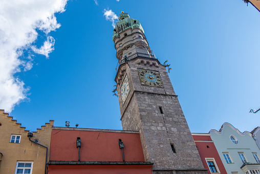 View of the City Tower, the tourist information center at old town Innsbruck in Austria. Located in the Inn valley in the Austrian Alps and capital of Tyrol,  it is one of the most important winter sports city in the world.
