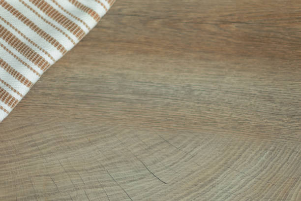 istock Wooden background with striped towel 1210359760