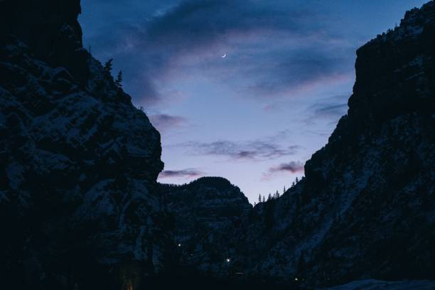 istock View of snowy mountains at dusk 1210365842