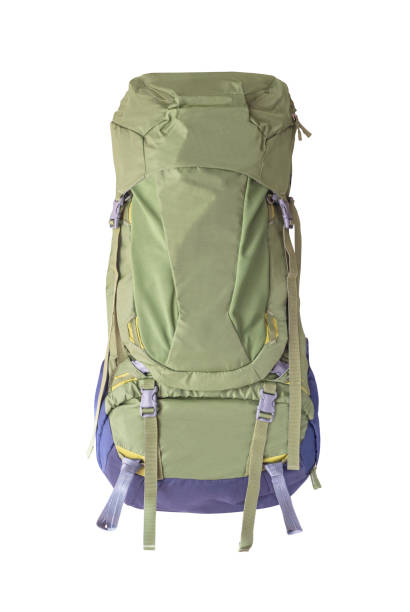 Green backpack for travel and trekking isolated on white background