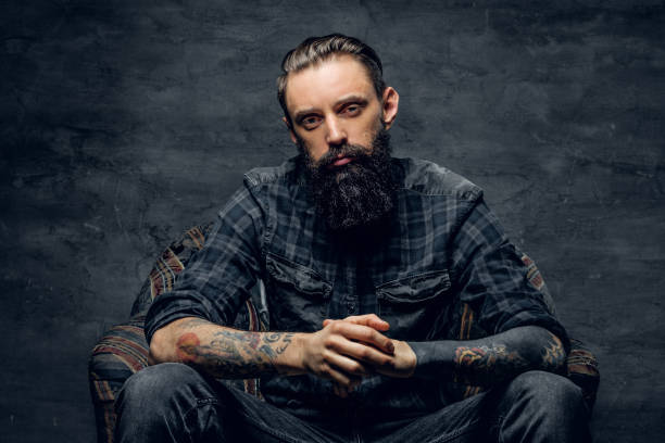 istock Portrait of dolorous bearded man at studio 1210367695