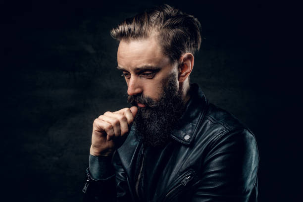 istock Portrait of dolorous bearded man at studio 1210367720