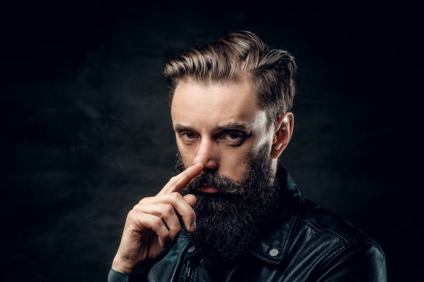 istock Portrait of dolorous bearded man at studio 1210367810