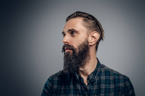 istock Portrait of dolorous bearded man at studio 1210367904
