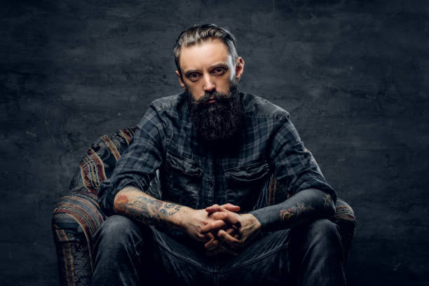 istock Portrait of dolorous bearded man at studio 1210368064